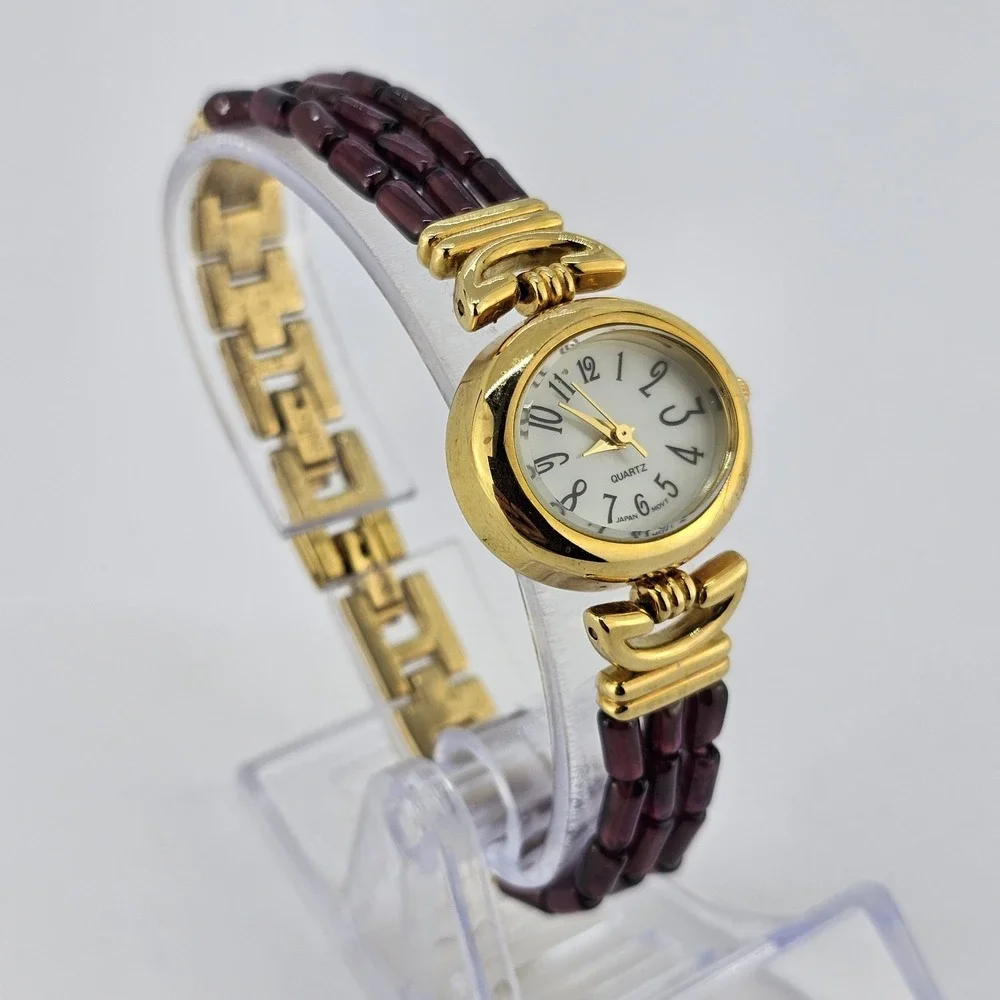 Women's Analog Watch‎ 25MM Light Yellow Dial Gold Purple Bands 6.75